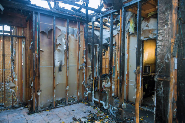 Professional Fire Damage Restoration technician working in Conashaugh Lakes, PA